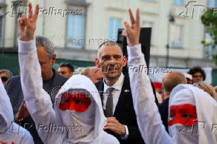 Siarhei Tsikhanouski attends a rally organised by Belarusian diaspora in Warsaw