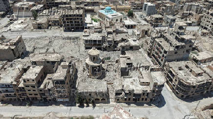 A drone view shows the damaged Armenian Genocide Memorial Church in Deir el-Zor
