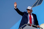 U.S. President Donald Trump boards Air Force One as he departs for Iowa, at Joint Base Andrews