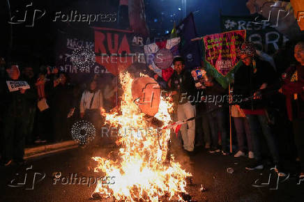 Demonstrators take part in a protest against U.S. President Donald Trump?s announcement of 50% tariffs on Brazilian products, in Sao Paulo