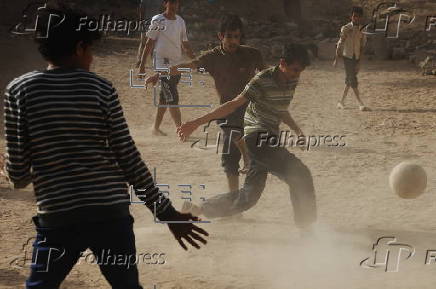 Yemeni youths play soccer in Sana'a