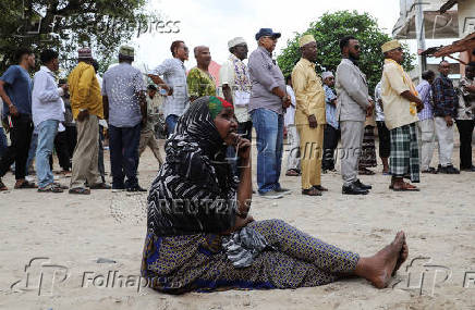 People have their biometrics recorded during voter registration, in Mogadishu