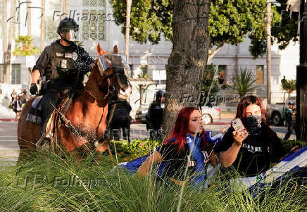 Protests against federal immigration sweeps continue in Los Angeles