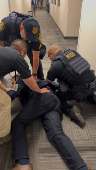 U.S. Senator Padilla is handcuffed by security during U.S. Homeland Security Secretary Noem's press conference, in Los Angeles