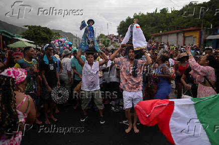 People celebrate Saint John the Baptist, in Ocumare de la costa