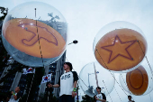 'Squid Game' characters parade through central Seoul