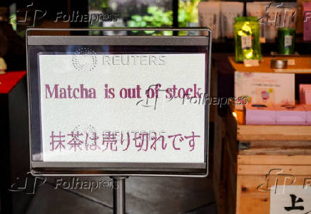 A sign board reading 'Matcha is out of stock' is displayed in front of a tea store in Uji, Kyoto prefecture
