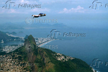 FILE PHOTO: Austrian base-jumper Felix Baumgartner, 32, glides through the air