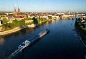 FILE PHOTO:  A drone view shows a barge on the Rhine river in front of the Muenster cathedral ahead of the Eurovision Song Contest in Basel