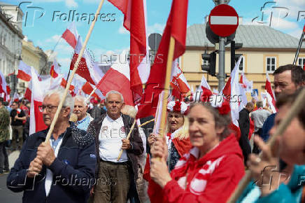 Poland's presidential candidate Nawrocki holds a march, in Warsaw