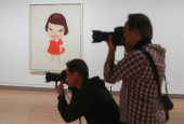 Japanese artist Yoshitomo Nara attends the largest European retrospective of his work in London