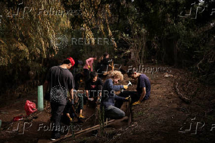 Chilean volunteers combat plastic waste in the Mapocho river, in Santiago