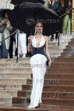 Guests arrive at Schiaparelli Haute Couture Fall/Winter 2025-2026 show in Paris