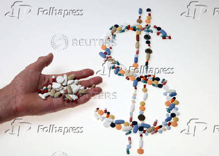 FILE PHOTO: Pharmaceutical tablets and capsules are arranged on a table in this picture illustration taken in Ljubljana