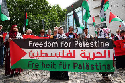 Pro-Palestinian protesters gather outside the foreign ministry, in Berlin