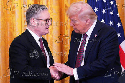 FILE PHOTO: British Prime Minister Starmer meets with U.S. President Trump in Washington