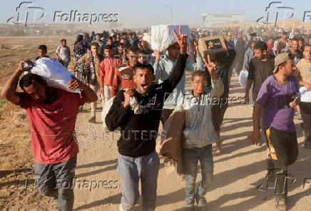 FILE PHOTO: Visual story on the ordeal Gazans endure to get food under new aid distribution programme in Khan Younis