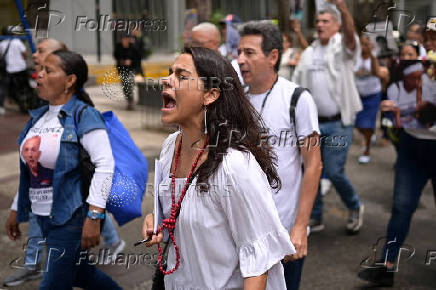 Relatives of detained Venezuelans, walk to the Miraflores presidential palace, in Caracas
