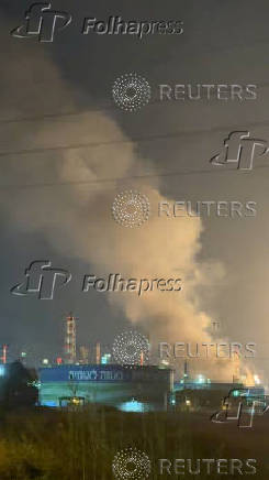 Smoke rises from a refinery's compound in Haifa