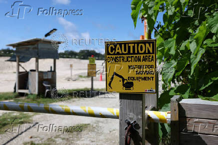 A construction sign is displayed outside the U.S. Tactical Mobile Over-the-Horizon Radar (TACMOR) site in Angaur