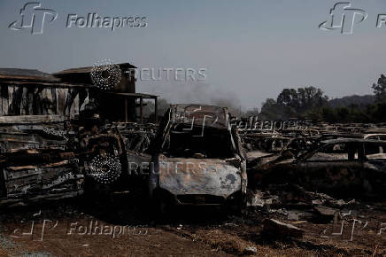 Wildfire burns houses, factories forcing evacuations near Patras
