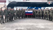 Russian younger POWs board buses in Belarus after release from Ukraine