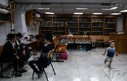 Israeli family stays in a bomb shelter, in Haifa