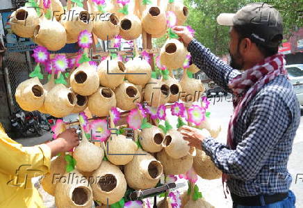 A vendor sells handmade birds nests in Hyderabad