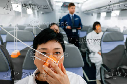 Crew members of Taiwan's China Airlines receive trainings at their center in Taoyuan