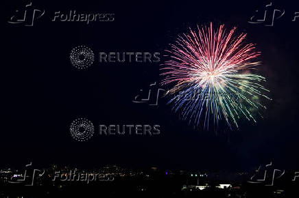 Fireworks explode near the Washington Monument during a Fourth of July celebration at the White House in Washington