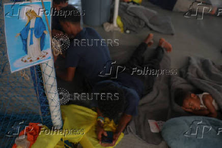 Rescued migrants aboard Sea-Watch 5 migrant search and rescue ship on their way to Italy
