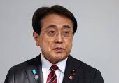 FILE PHOTO: Japan's Economic Revitalization Minister Ryosei Akazawa speaks to the press in Tokyo