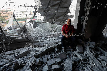 Israeli army demolishes the house of a Palestinian assailant, in Hebron