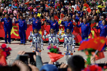 Astronauts attend a see-off ceremony for the Shenzhou-20 spaceflight mission at Jiuquan Satellite Launch