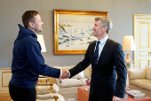 Denmarks King Frederik greets Greenland's new Prime Minister Jens-Frederik Nielsen at Amalienborg Palace in Copenhagen