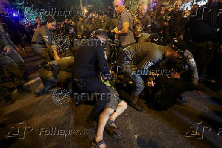 Demonstrators protest outside Likud Party headquarters calling for the release of all hostages as Israel marks 600 days since they were kidnapped, in Tel Aviv