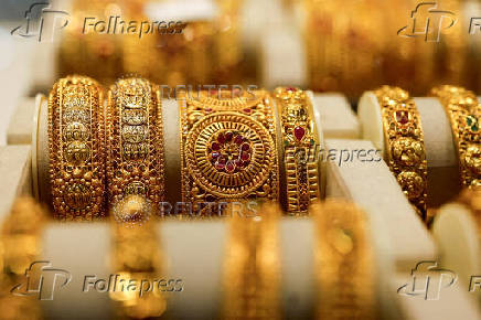 FILE PHOTO: FILE PHOTO: Gold bangles are displayed at a jewellery store in Mumbai