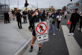 Protesters gather around the Los Angeles Federal Building after multiple detentions by ICE, in Los Angeles