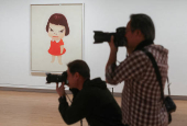 Japanese artist Yoshitomo Nara attends the largest European retrospective of his work in London