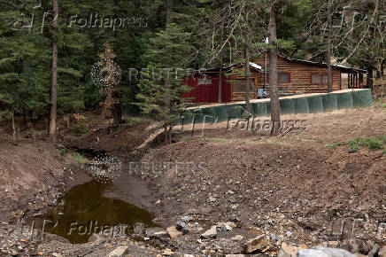 A year after the South Fork and Salt Fires ravaged a New Mexico Mountain village