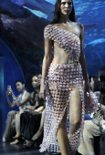 Recycled waste fashion show in Bangkok displays clothing created from trash