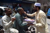 Markazi Muslim League celebrate after Pakistan shoots down Indian fighter jets