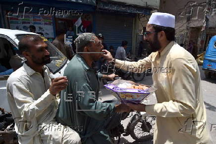 Markazi Muslim League celebrate after Pakistan shoots down Indian fighter jets