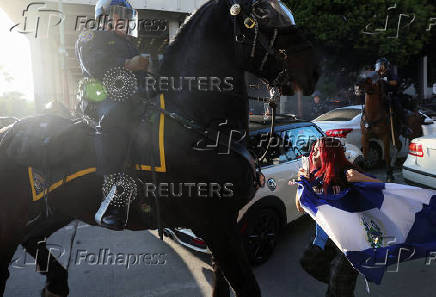 Protests against federal immigration sweeps continue, in Los Angeles