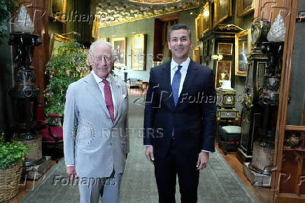 Paraguay's President Santiago Pena Palacios meets with Britain's King Charles during an audience at Windsor Castle