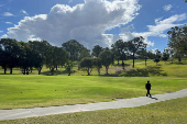 A man walks at the Victoria Park-Barrambin, in Brisbane