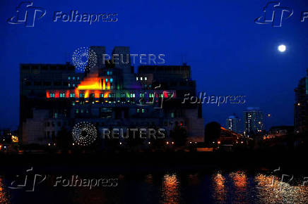 FILE PHOTO: The MI6 building is illuminated to mark the  Pride in London Parade in London