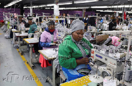 Workers perfom their duties at Quantum apparel factory on the outskirts of Maseru