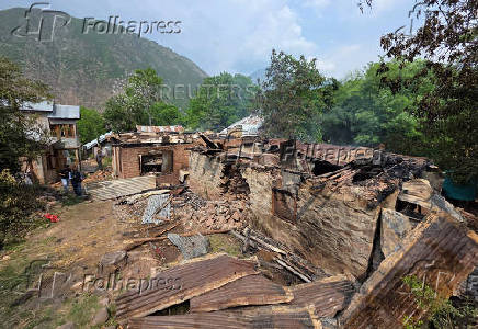 Residential houses are pictured after they were damaged by a cross-border shelling in Salamabad