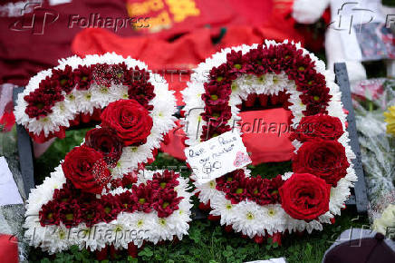 Fans pay their respects to late soccer player Diogo Jota, at Anfield Stadium in Liverpool